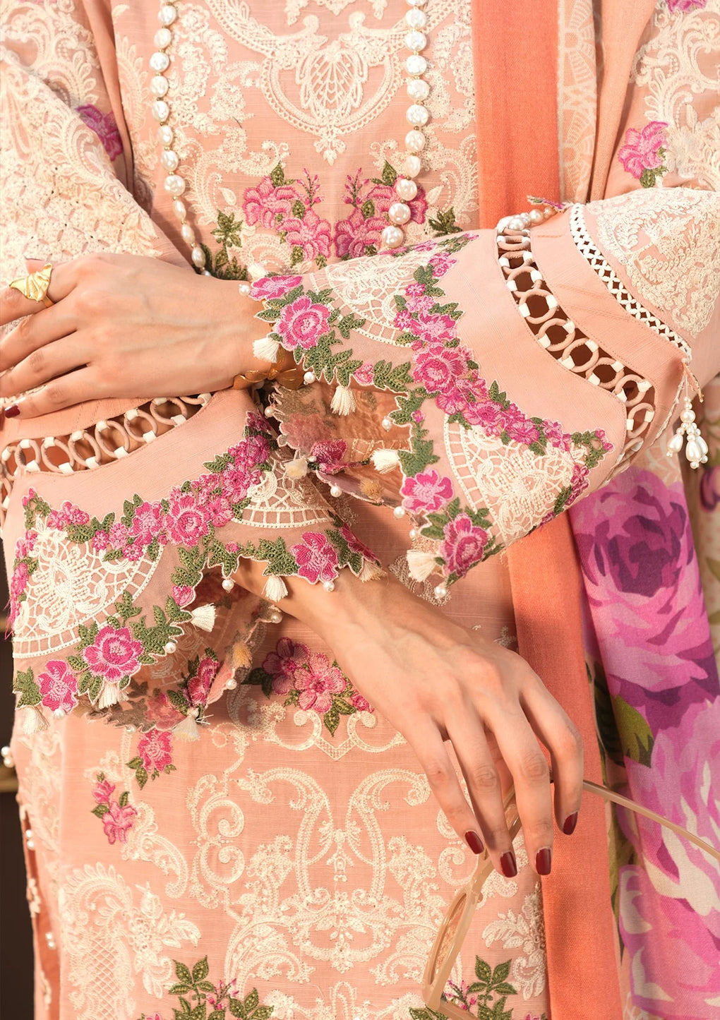 closeup image of EMBROIDERED ORGANZA SLEEVES BORDER