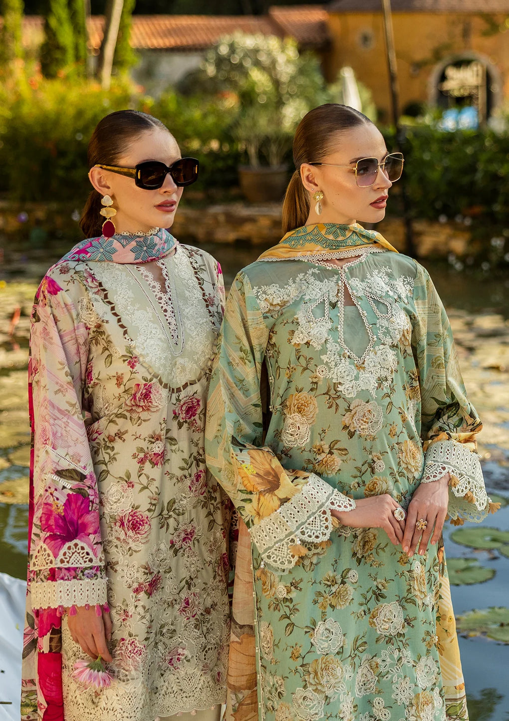 wearing elegant lawn dresses with vibrant prints.