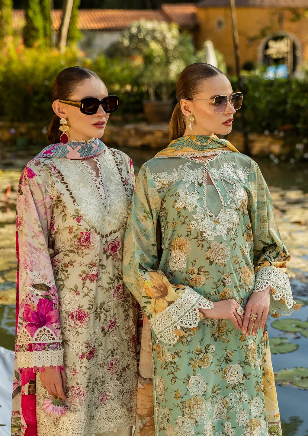 wearing elegant lawn dresses with vibrant prints.