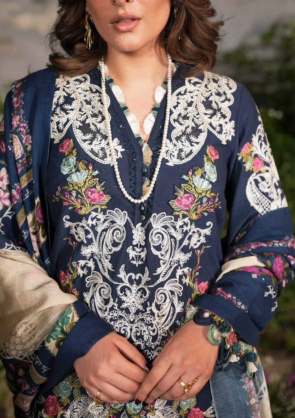 Another front closeup image of EMBROIDERED ORGANZA FRONT LEFT & RIGHT NECK MOTIFS in navy blue color.